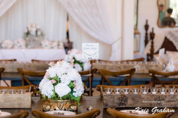 Alighted with candles and florals for a touch of rustic elegance. 