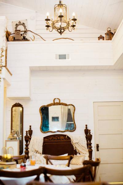 Our venue hosts beautiful details like antique mirrors and furniture. 