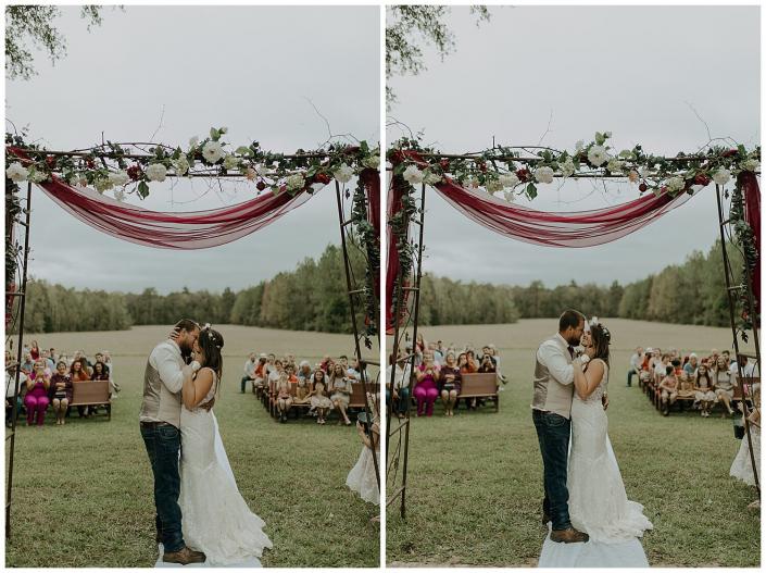 Bride and groom kissing after saying "I do"
